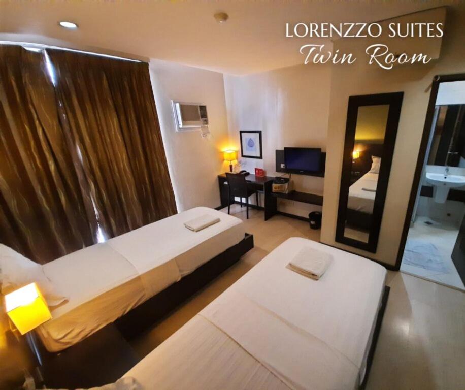 Postel nebo postele na pokoji v ubytování MAKATI Boutique Hotel near NAIA Airport Terminal 3 Edsa Pasay CBD