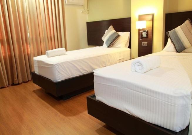 Postel nebo postele na pokoji v ubytování MAKATI Boutique Hotel near NAIA Airport Terminal 3 Edsa Pasay CBD