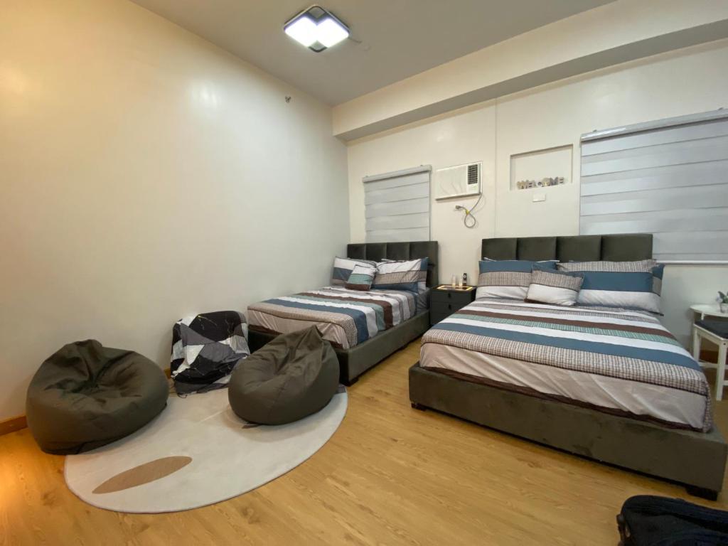Twenty-Nine Cats - SMDC Cheer Residences Marilao - Appartement Avec Vue Sur Le Jardin