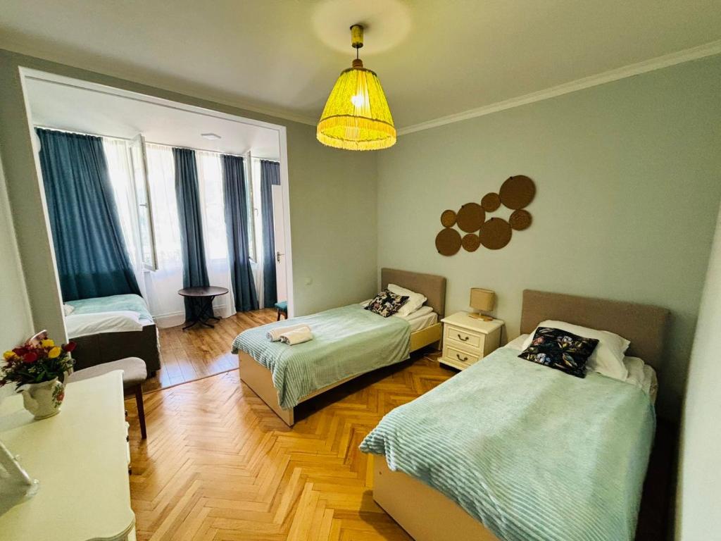 Postel nebo postele na pokoji v ubytování Happy Holidays