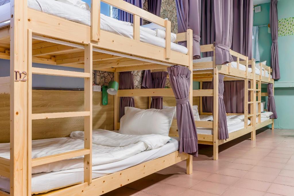 Postel nebo postele na pokoji v ubytování 5-1 Homestay