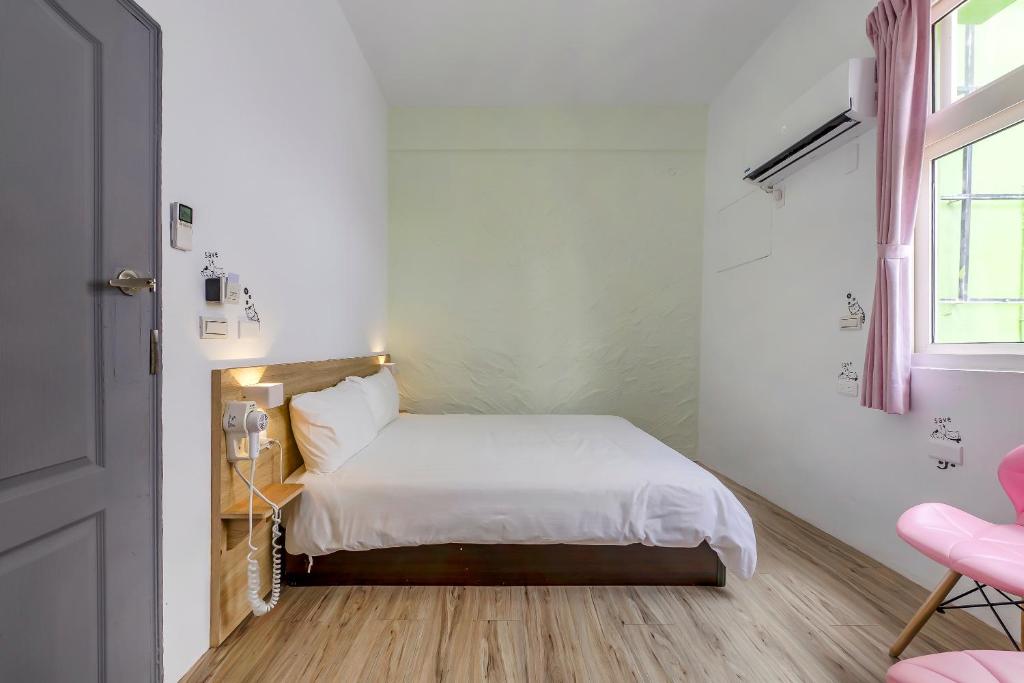 Postel nebo postele na pokoji v ubytování 5-1 Homestay