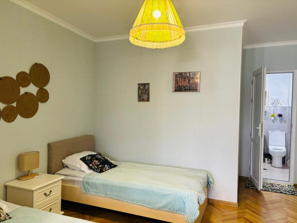 Postel nebo postele na pokoji v ubytování Happy Holidays