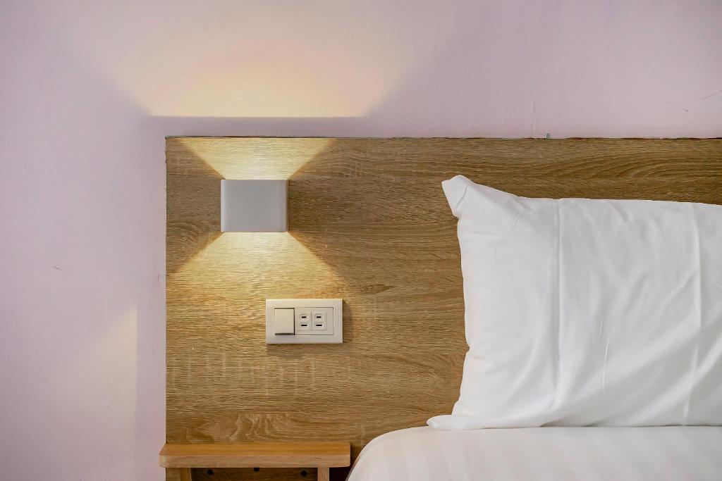 Postel nebo postele na pokoji v ubytování 5-1 Homestay