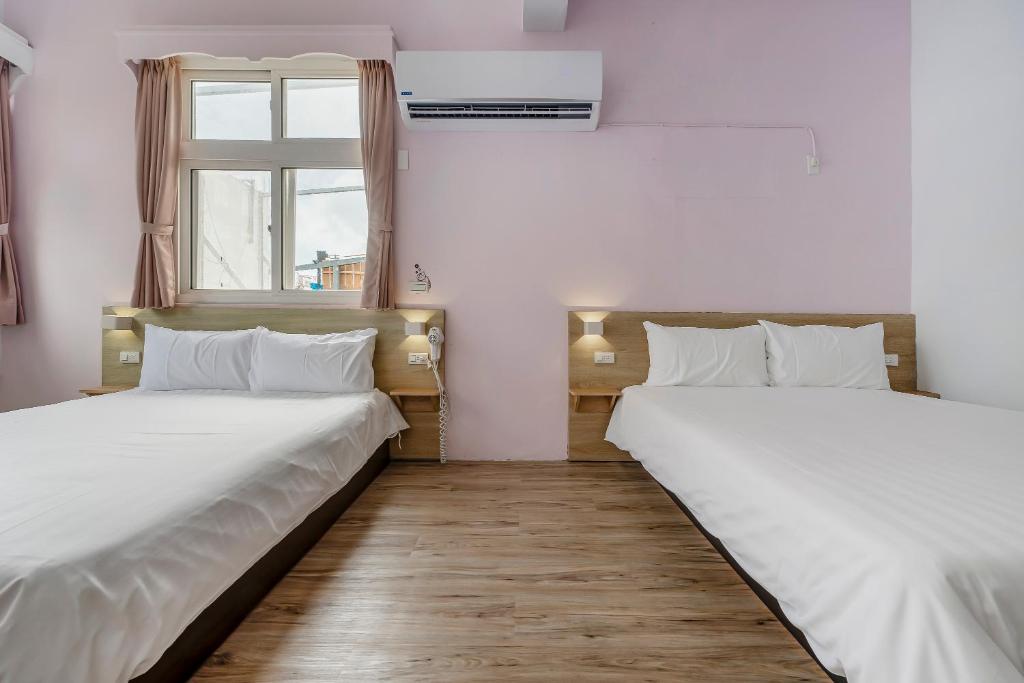 Postel nebo postele na pokoji v ubytování 5-1 Homestay