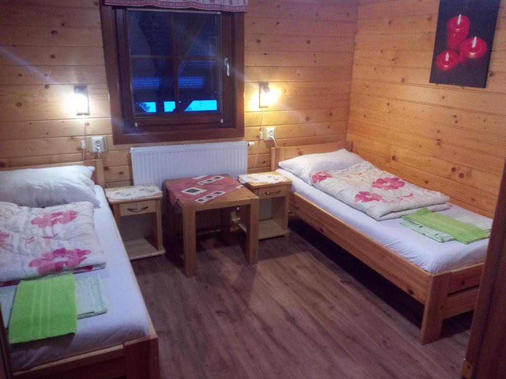 Voodi või voodid majutusasutuse apartmany Sofia toas