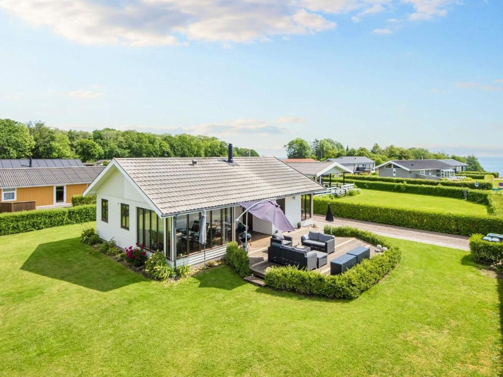 an aerial view of a house with a yard at 4 star holiday home in Juelsminde-By Traum in Sønderby