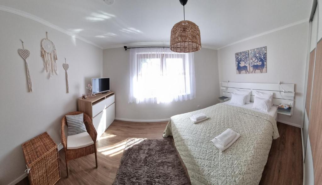 Postel nebo postele na pokoji v ubytování Villa V53 Siófok