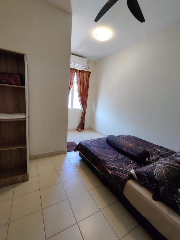 Postel nebo postele na pokoji v ubytování Homestay Adleya