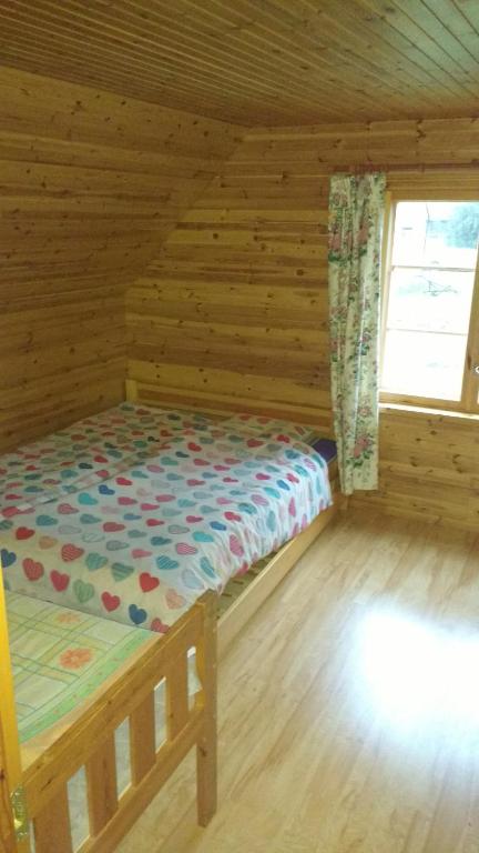 Postel nebo postele na pokoji v ubytování Aratsaare Holiday home