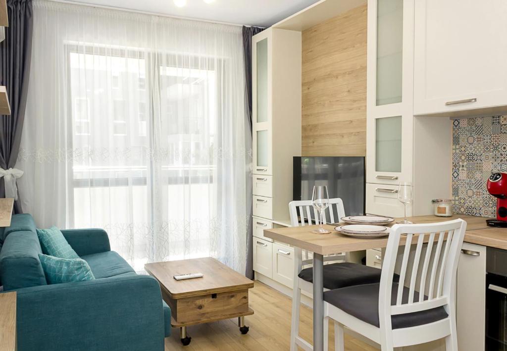 Posezení v ubytování Homey 1-BD Apartment in Varna, next to Grand Mall Varna by Flat Mаnаger