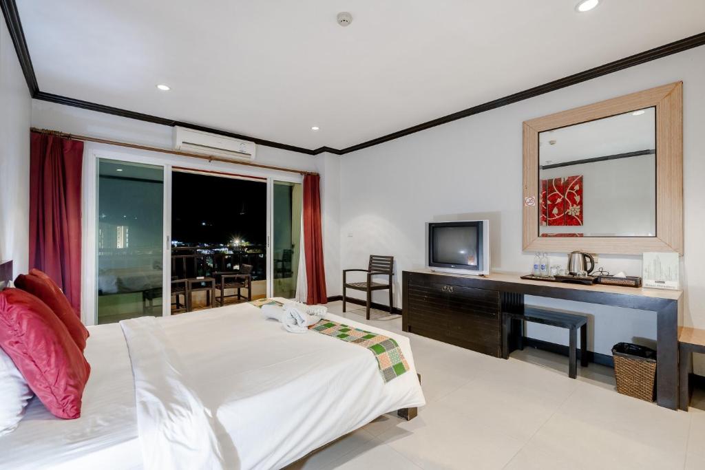 Postel nebo postele na pokoji v ubytování Napalai Resort Hua Hin