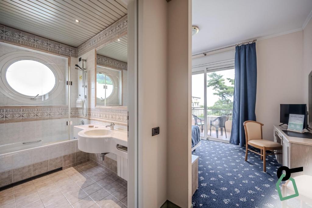 Koupelna v ubytování Hotiday Room Collection - Stresa