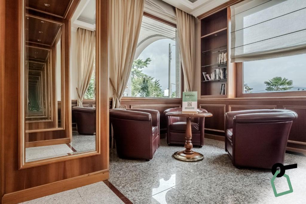 Posezení v ubytování Hotiday Room Collection - Stresa
