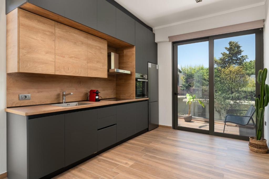 Cuisine ou kitchenette dans l'établissement La Siesta Villas