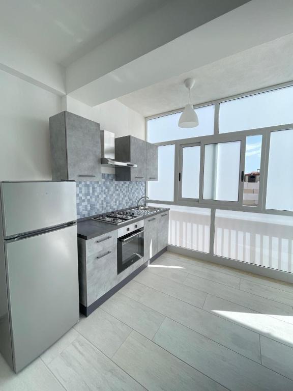 Kuchyň nebo kuchyňský kout v ubytování Leverblu House
