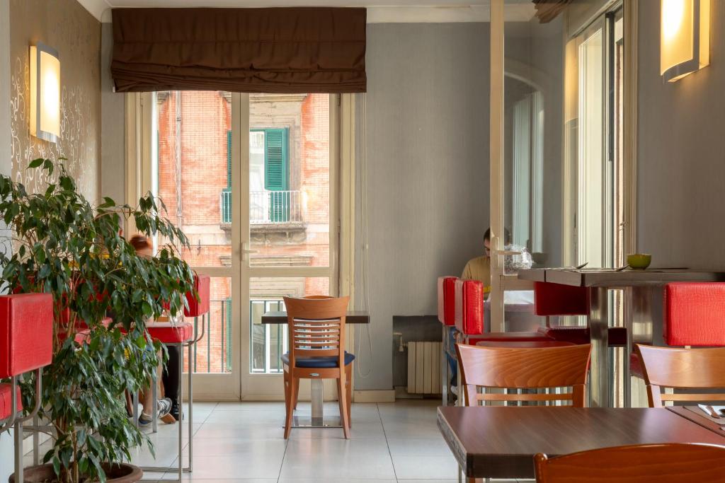 Posezení v ubytování Napolit'amo Hotel Medina