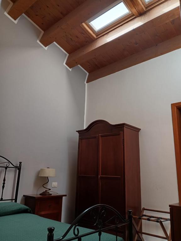 Postel nebo postele na pokoji v ubytování Sorella Luna