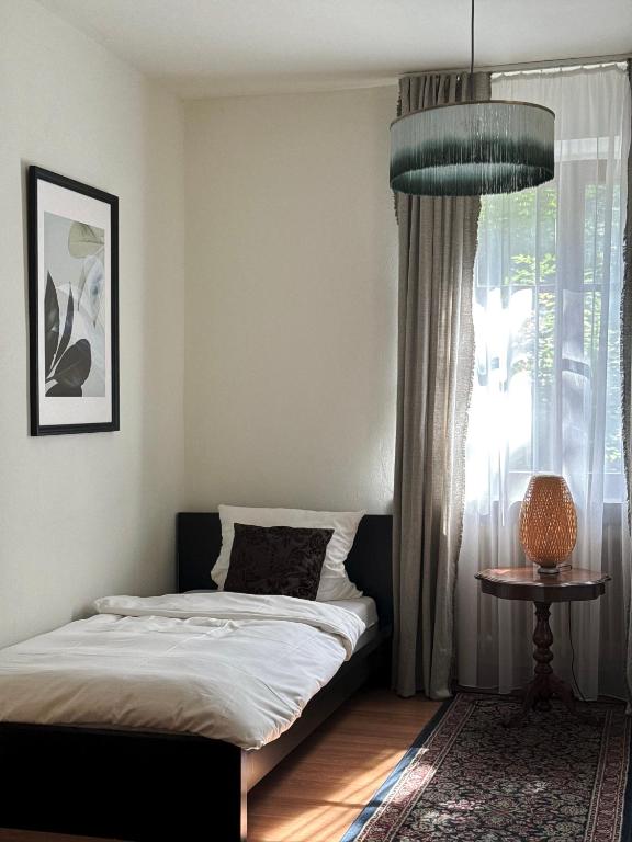 Ein Bett oder Betten in einem Zimmer der Unterkunft Drachenburg
