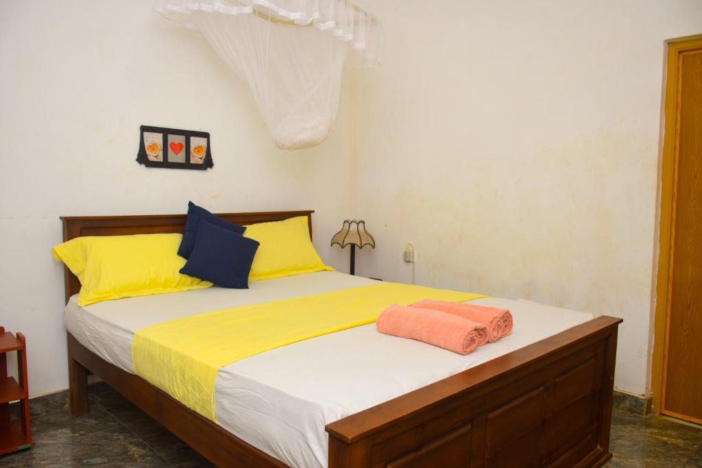 Postel nebo postele na pokoji v ubytování Senu Homestay