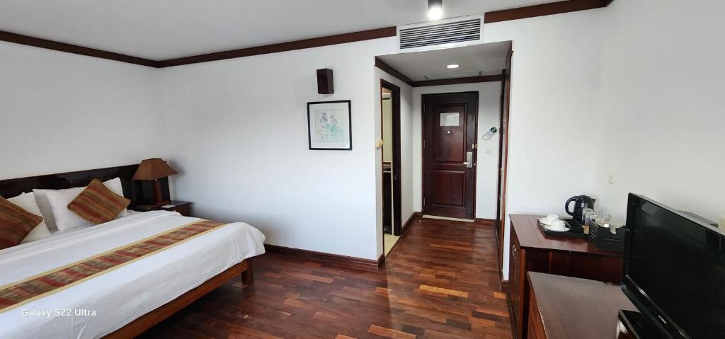 TV a/nebo společenská místnost v ubytování EG Paradise Angkor Villa Hotel