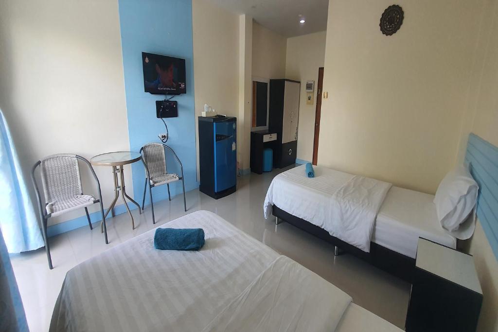 Postel nebo postele na pokoji v ubytování M Resort