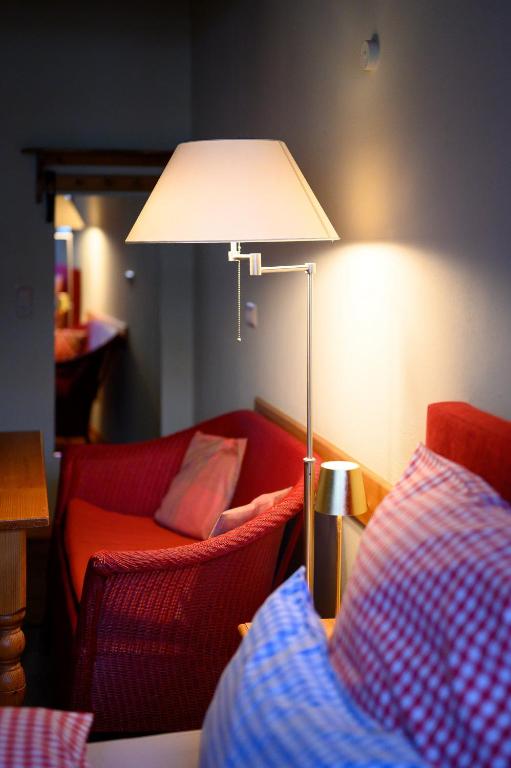 Postel nebo postele na pokoji v ubytování Hotel Pension St Nikolai