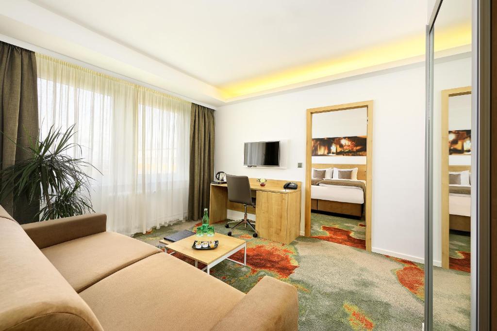 TV a/nebo společenská místnost v ubytování Hotel Duo