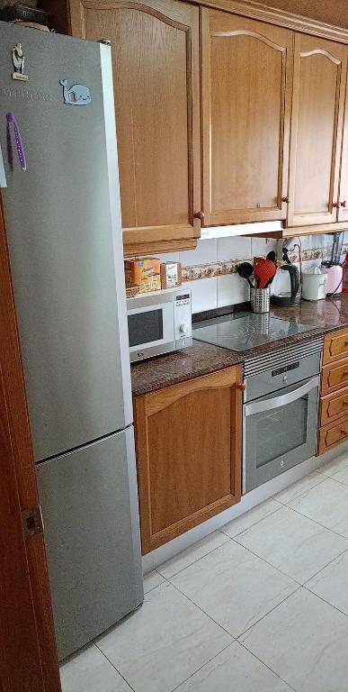 Kuchyňa alebo kuchynka v ubytovaní Apartamento, en pueblo pesquero