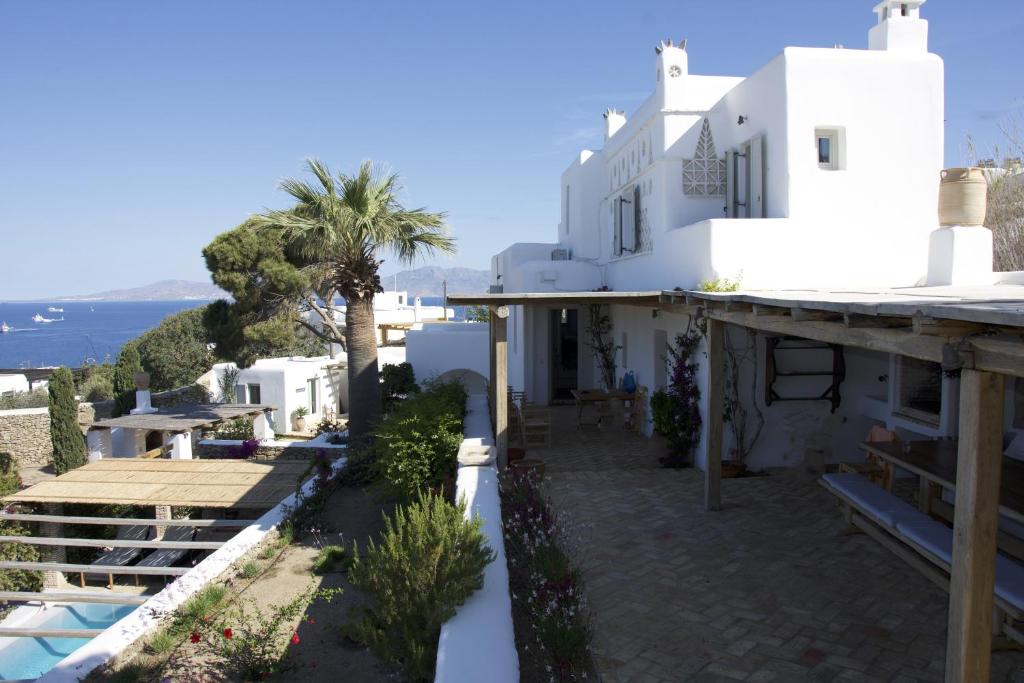 a view of a white house with a swimming pool at Villa Baroness in Mykonos Town in Mýkonos City