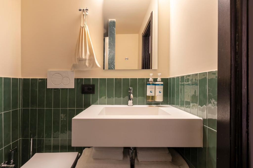 Koupelna v ubytování Numa Rome Barberini