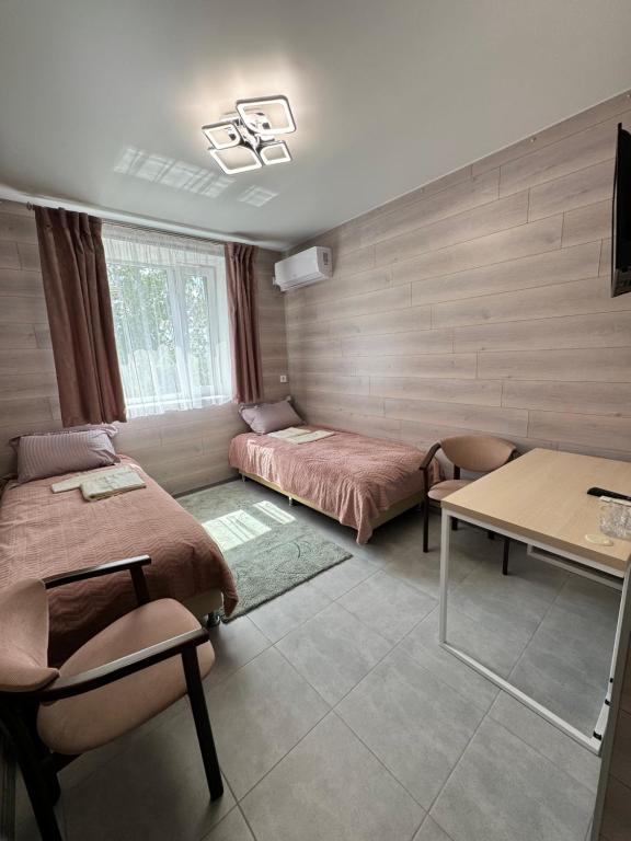 TV a/nebo společenská místnost v ubytování Hotel TETRIS Voznesensk