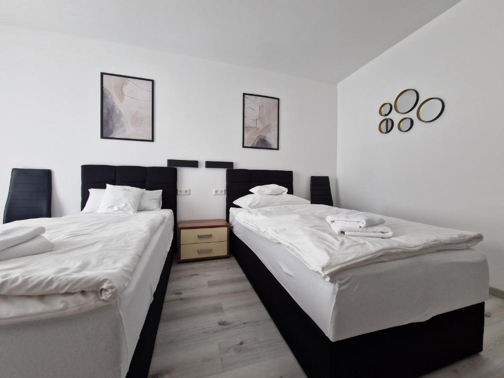 Postel nebo postele na pokoji v ubytování Hotel am Kurpark