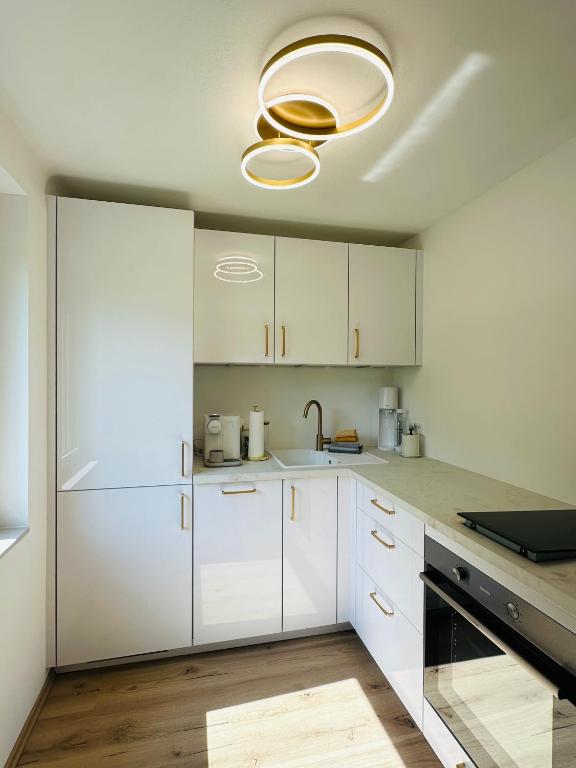 Kuchyň nebo kuchyňský kout v ubytování Ferienwohnung De luxe Kramer