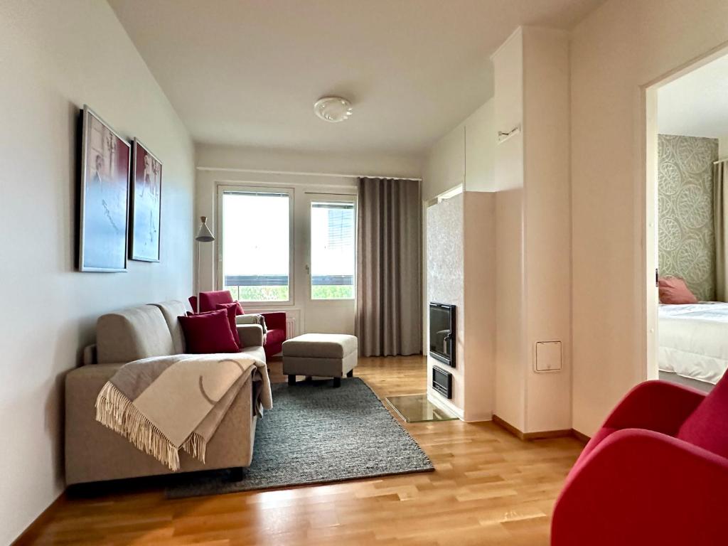 Postel nebo postele na pokoji v ubytování Aurora Sky Apartment