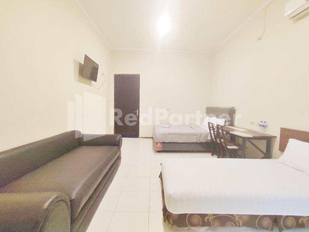 Posezení v ubytování Mutiara Residence Near Simpang Lima Mitra RedDoorz