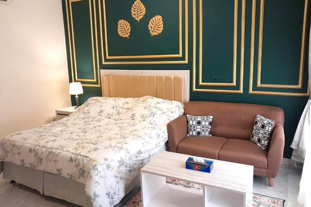 Postel nebo postele na pokoji v ubytování Puri Sawo Manila