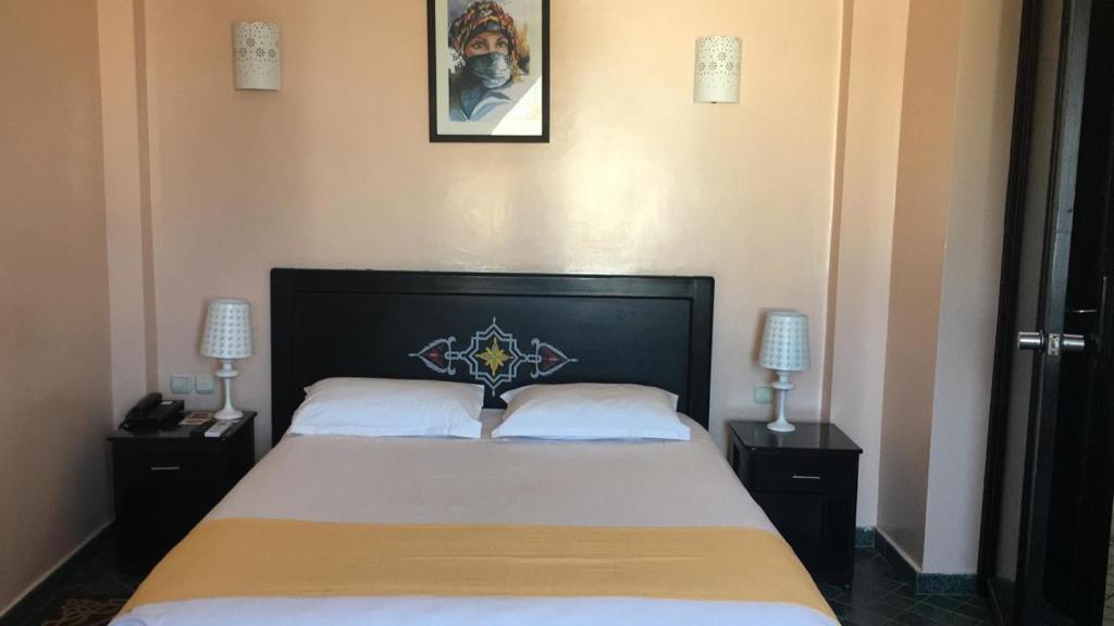 Postel nebo postele na pokoji v ubytování Hôtel Texuda