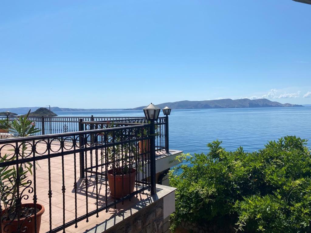 a balcony with a view of the water at Villa Dabac in Sveti Juraj