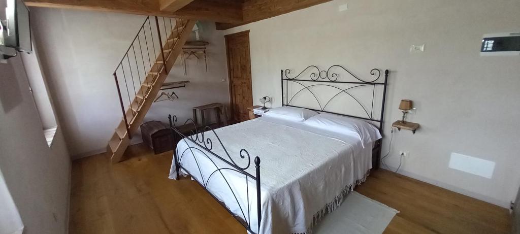 Postel nebo postele na pokoji v ubytování La Casa di LILLIA