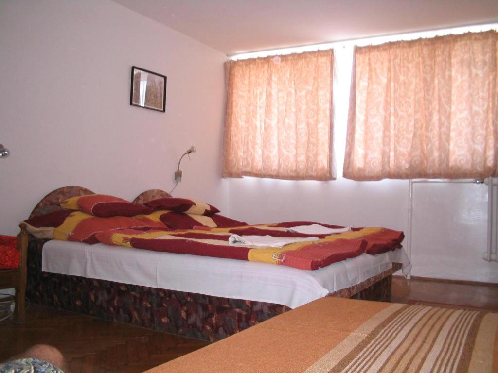 Łóżko lub łóżka w pokoju w obiekcie Burg Eger
