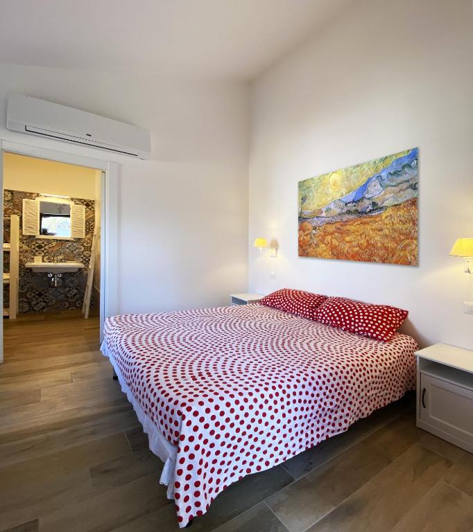 Postel nebo postele na pokoji v ubytování Le Tre Lune B&B