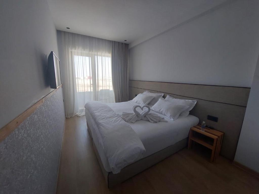Postel nebo postele na pokoji v ubytování Seashell