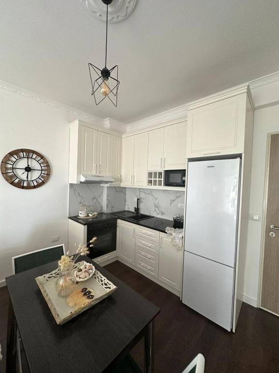 Kuchyň nebo kuchyňský kout v ubytování Blue Brace Apartment