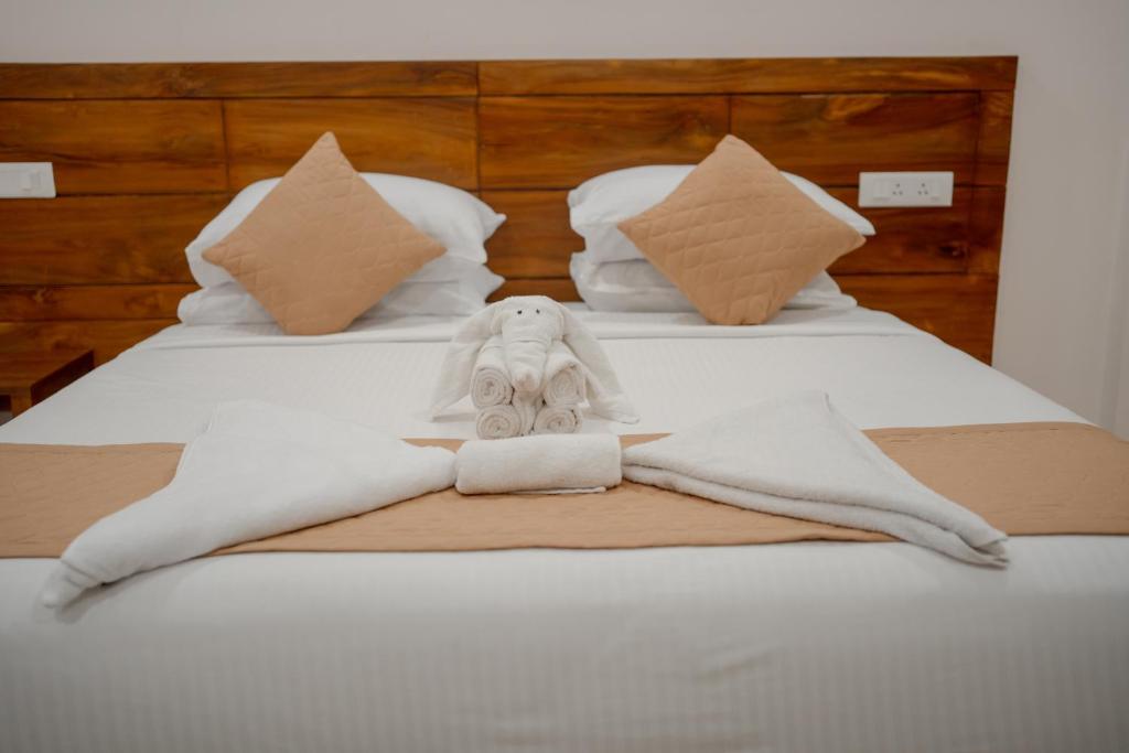 Postel nebo postele na pokoji v ubytování Daffodils Luxury Airport Suites