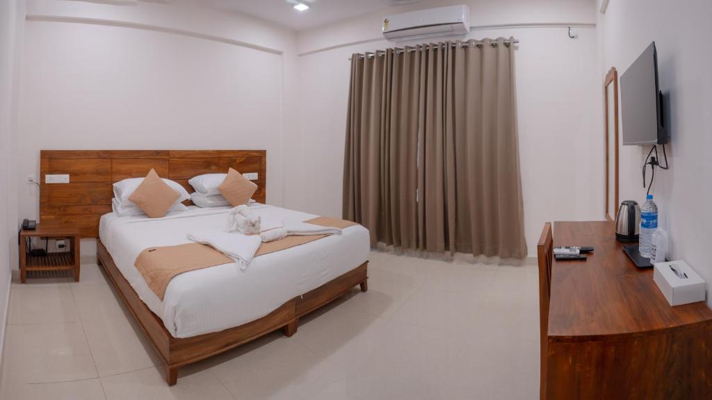 Postel nebo postele na pokoji v ubytování Daffodils Luxury Airport Suites