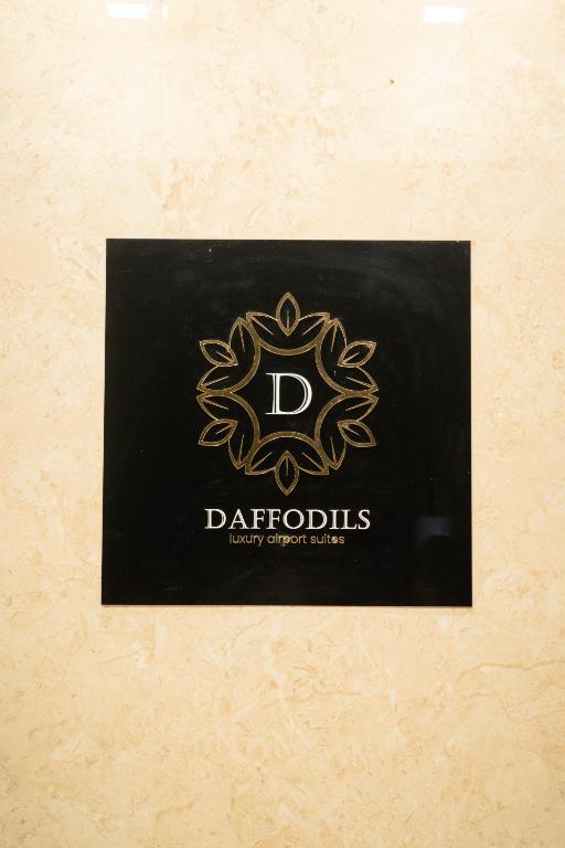 Certifikát, hodnocení, plakát nebo jiný dokument vystavený v ubytování Daffodils Luxury Airport Suites