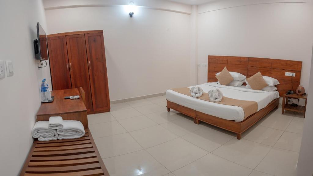 Postel nebo postele na pokoji v ubytování Daffodils Luxury Airport Suites