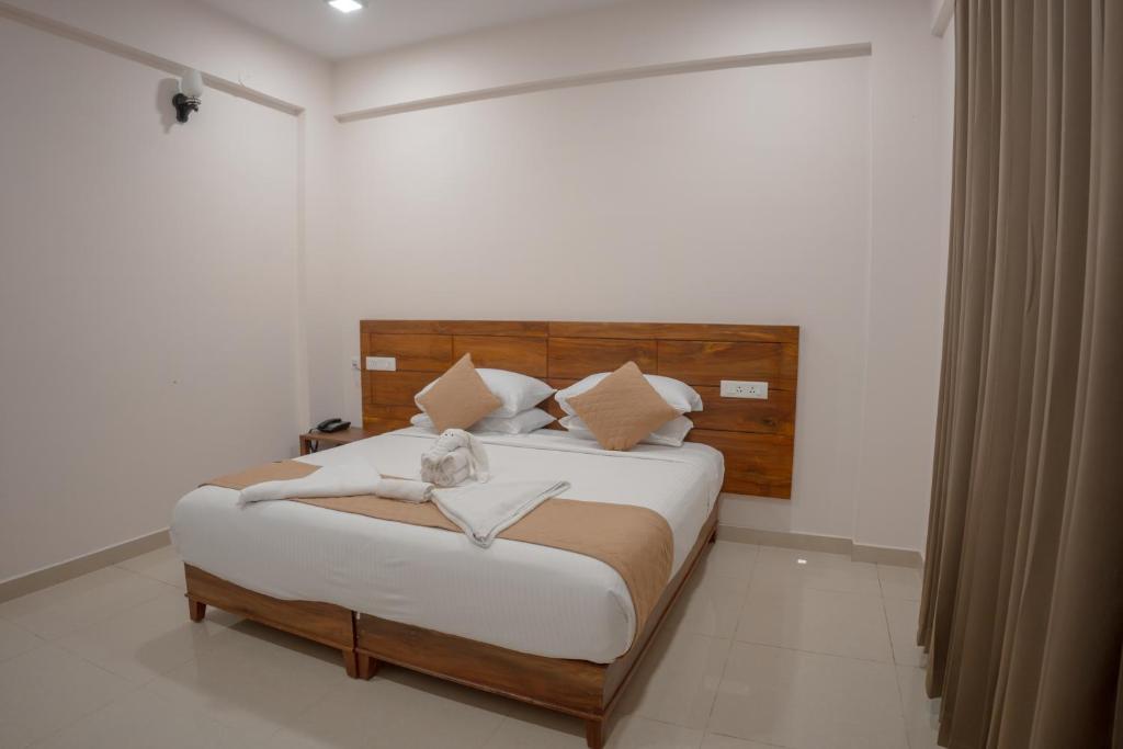 Postel nebo postele na pokoji v ubytování Daffodils Luxury Airport Suites