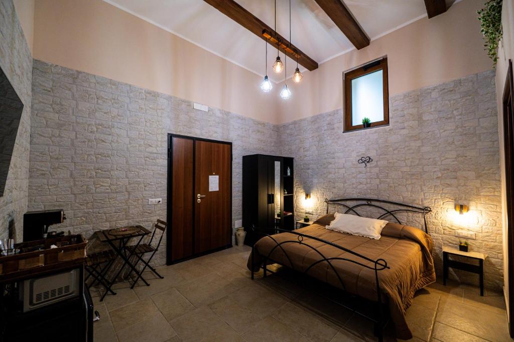 Ένα ή περισσότερα κρεβάτια σε δωμάτιο στο Room-Antica